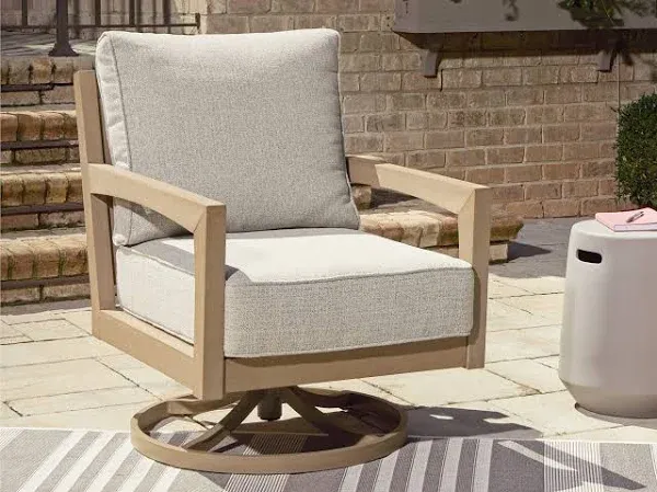 Hallow Creek Outdoor Nuvella Fabric Swivel Lounge Chair